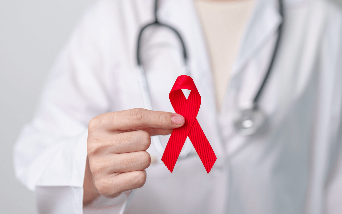 HIV Heilung Symbolbild: Aids-Schleife. Englisch: HIV cure Symbolic image: Aids ribbon.