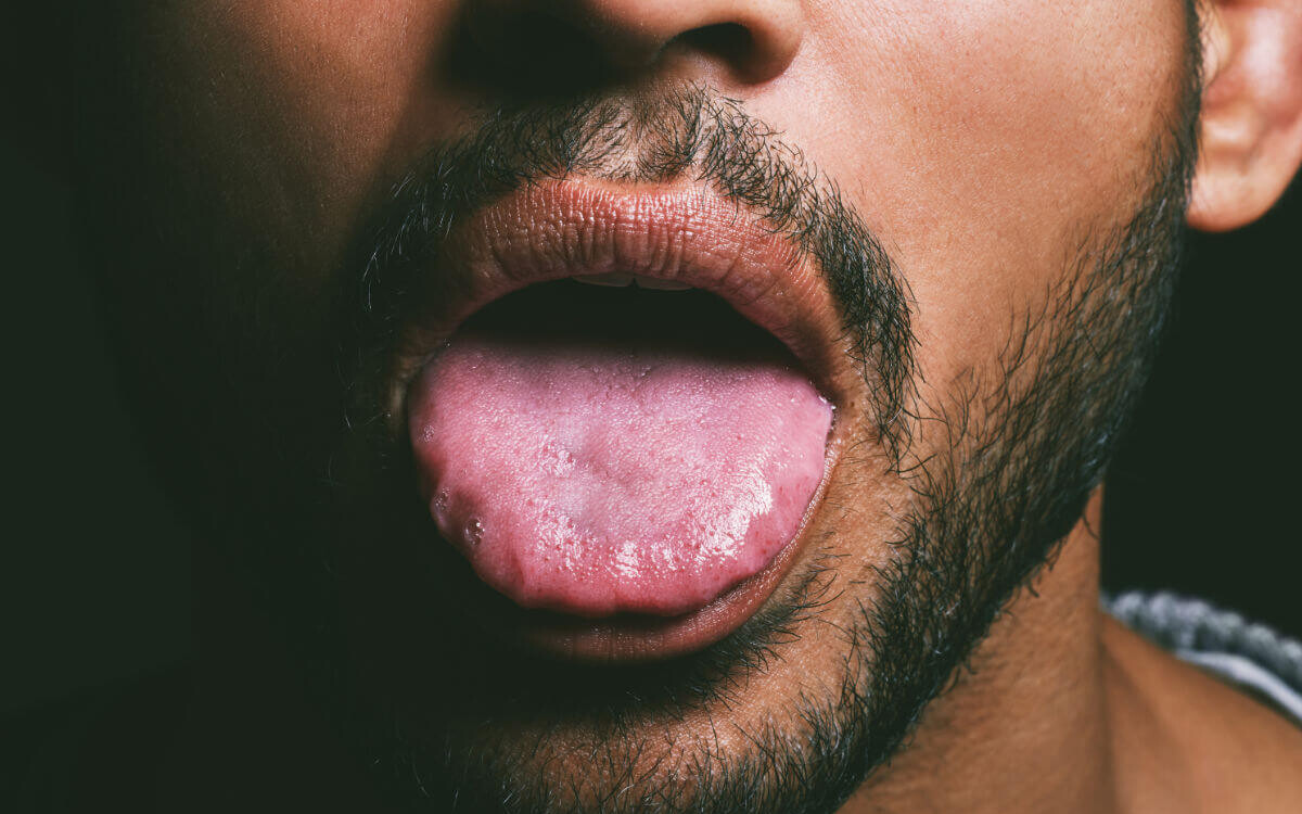 Sloppy Blowjob Symbolbild: Männerzunge Englisch: Sloppy blowjob symbol image: male tongue