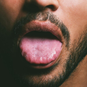 Sloppy Blowjob Symbolbild: Männerzunge Englisch: Sloppy blowjob symbol image: male tongue